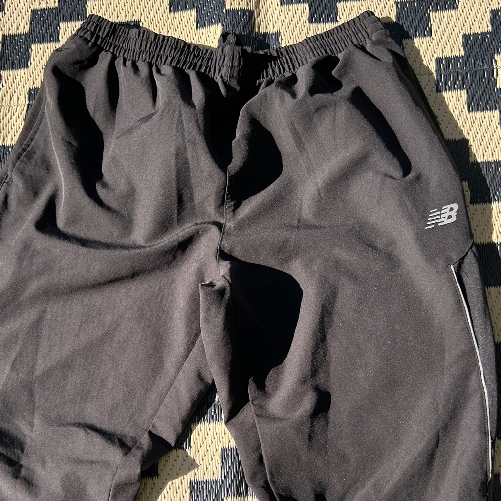 New Balance Men’s Black Athletic Pants With Ankle Zip Detail And Pockets